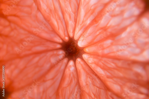 Macro shot of grapefruit on the table and on the background