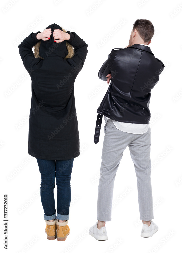 Back view of couple in winter jacket. Back view of couple in winter jacket.