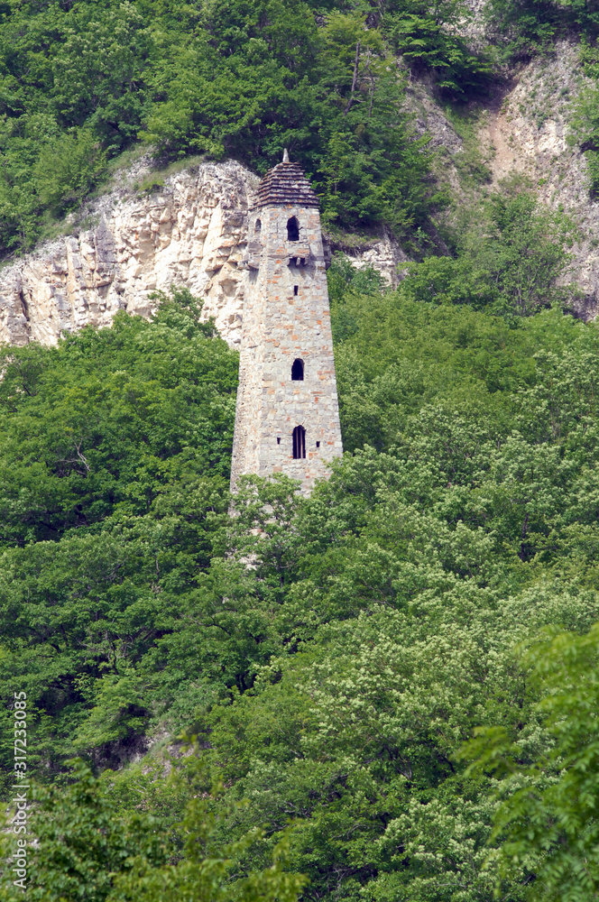 Medieval watch tower on the bank of Argun River. Chechnya (Chechen Republic), Russia, Caucasus.