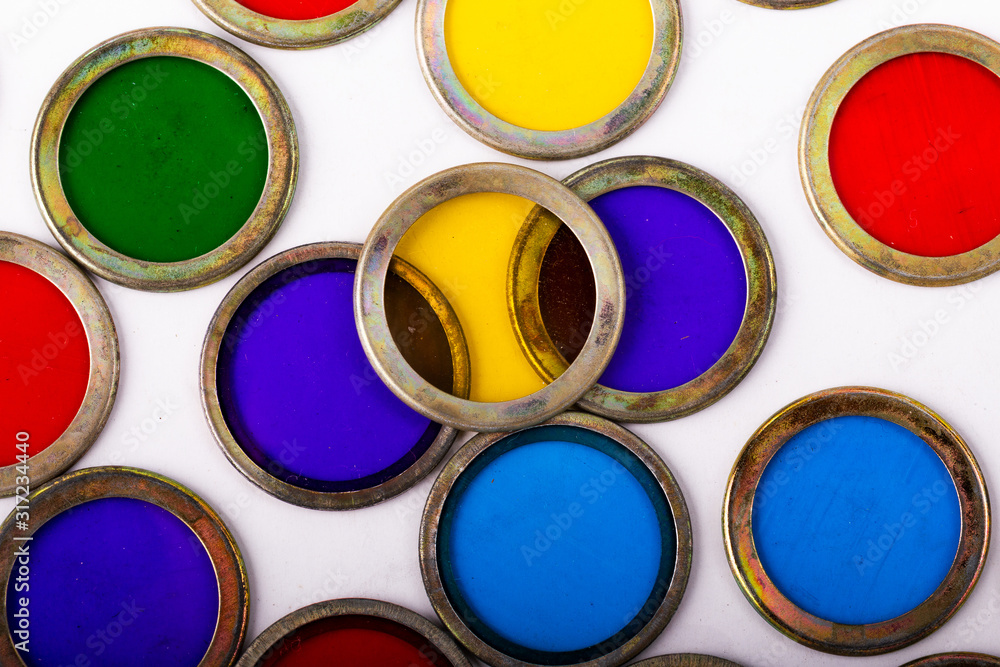 Fototapeta premium Colorful filter rings on isolated white background 