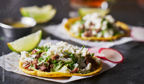 carne asada mexican tacos with crumbled queso fresco cheese photo