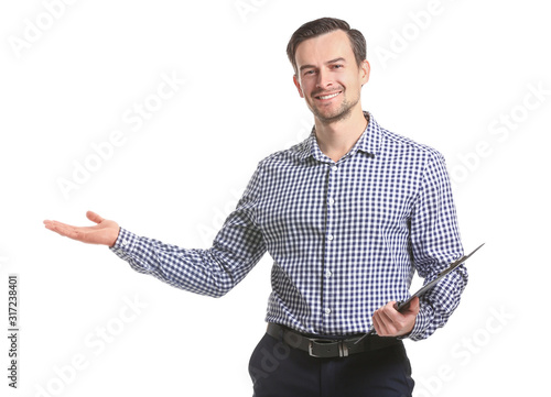 Male real estate agent showing something on white background photo