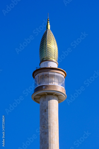 The Great Mosque Sleman Tower against blue sky photo