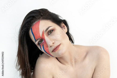 Obraz na płótnie red and blue lightning bolt on her beautiful face