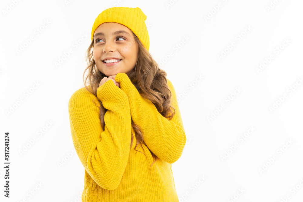 valentine's day concept. cute teenager girl in cozy yellow clothes on a white background valentine's day concept. cute teenager girl in cozy yellow clothes on a white background