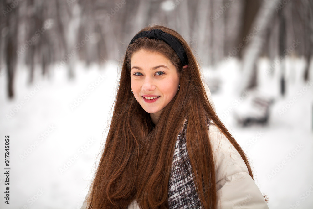 Fototapeta premium Fashion young girl in the winter time