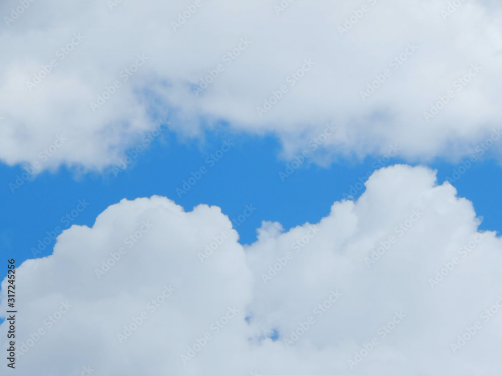 light blue sky with clouds, horizontal photo light blue sky with clouds, horizontal photo