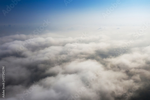 Fototapeta Naklejka Na Ścianę i Meble -  Big Blue sky and Cloud Top view from airplane window,Nature background