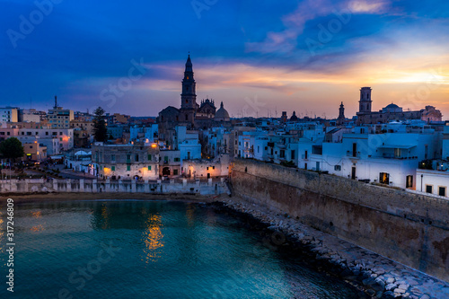 Aerial view, from the old town of Monopoli, at dusk, Puglia, Italy,