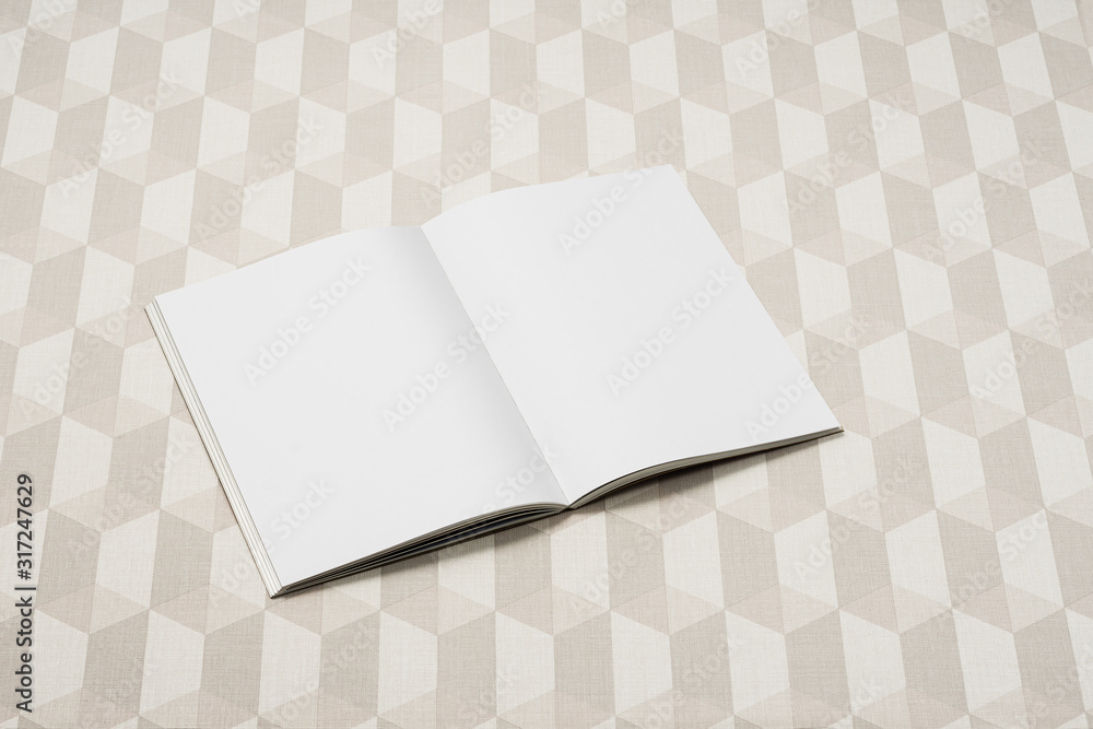 Mock-up magazine, newspaper or catalog isolated on checkered background. Mock-up magazine, newspaper or catalog isolated on checkered background.