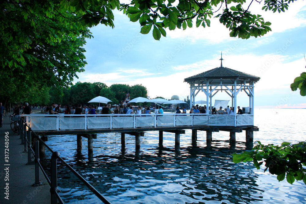 Bregenz / Austria - June 06 2019: Restaurant on Harbor Bridge on the lake in Bregenz, Austria.