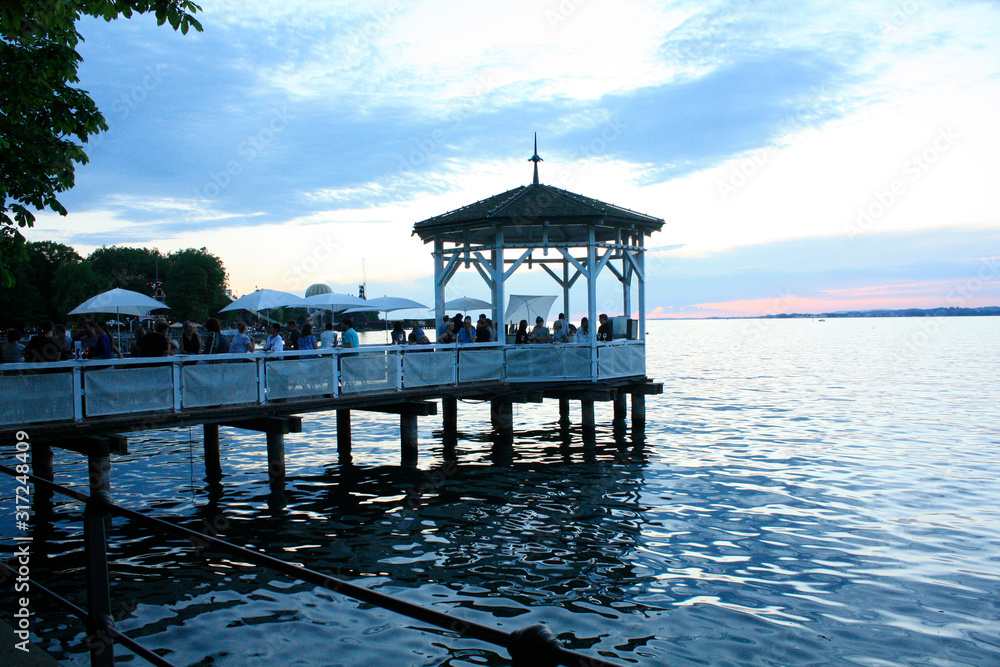 Bregenz / Austria - June 06 2019: Restaurant on Harbor Bridge on the lake in Bregenz, Austria.