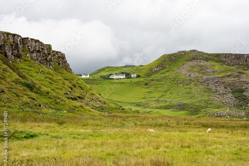 Scottish landscape near Rubha nam Brathairean (Brothers Point) in Isle of Skye in Scotland with picturesque houses