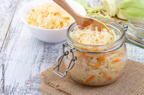 Fresh pickled cabbage - sauerkraut with carrot. photo
