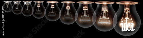 Dark and Shining Light Bulbs with Idea Concept © EtiAmmos