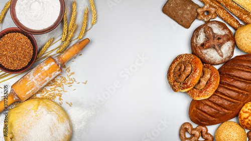 Fresh bakery products and ingredients for his cooking, banner with space for text, top view