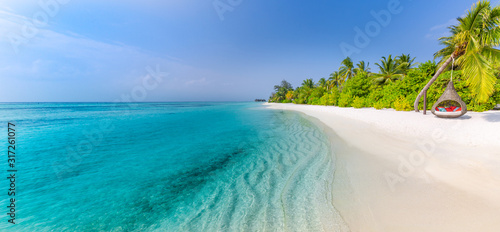 Fototapeta Naklejka Na Ścianę i Meble -  Beautiful tropical beach landscape banner. White sand and coco palms wide panorama background concept. Amazing beach scene use for summer vacation and exotic holiday, luxury travel tourism destination