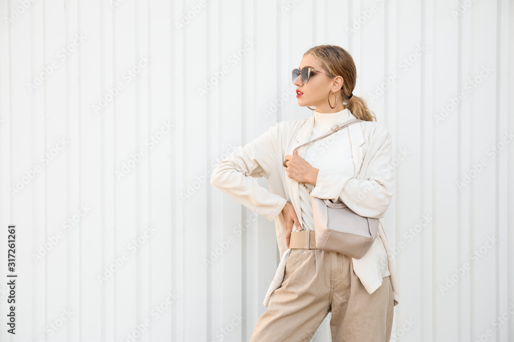 Portrait of fashionable young woman on white background Portrait of fashionable young woman on white background