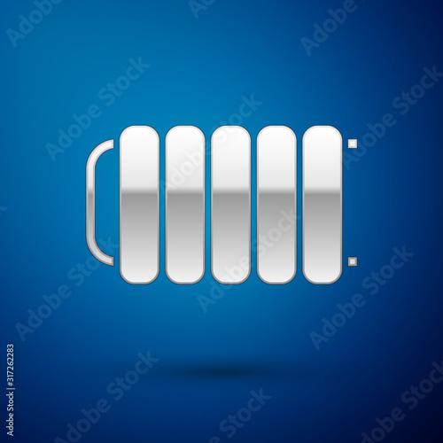 Silver Heating radiator icon isolated on blue background. Vector Illustration