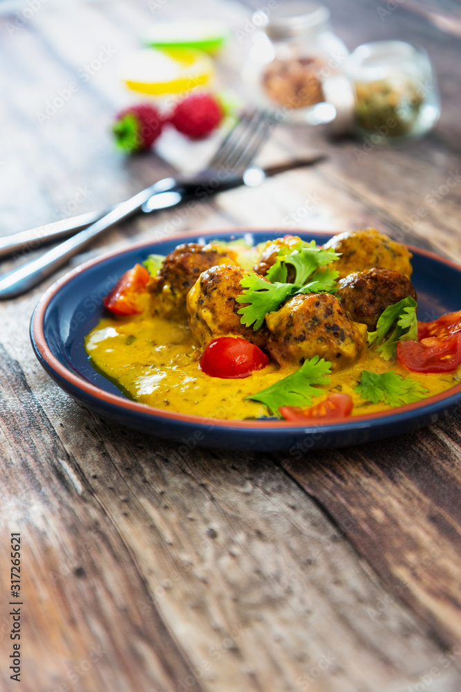 6 vegetable balls and quinoa , curry coconut cream 6 vegetable balls and quinoa , curry coconut cream