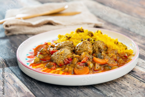 Kofta Tagine Moroccan Meatballs Served With Semolina and Vegetables