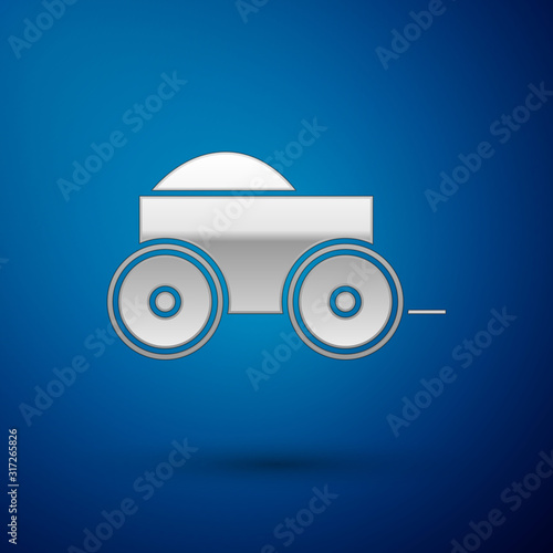 Silver Wooden four-wheel cart with hay icon isolated on blue background. Vector Illustration