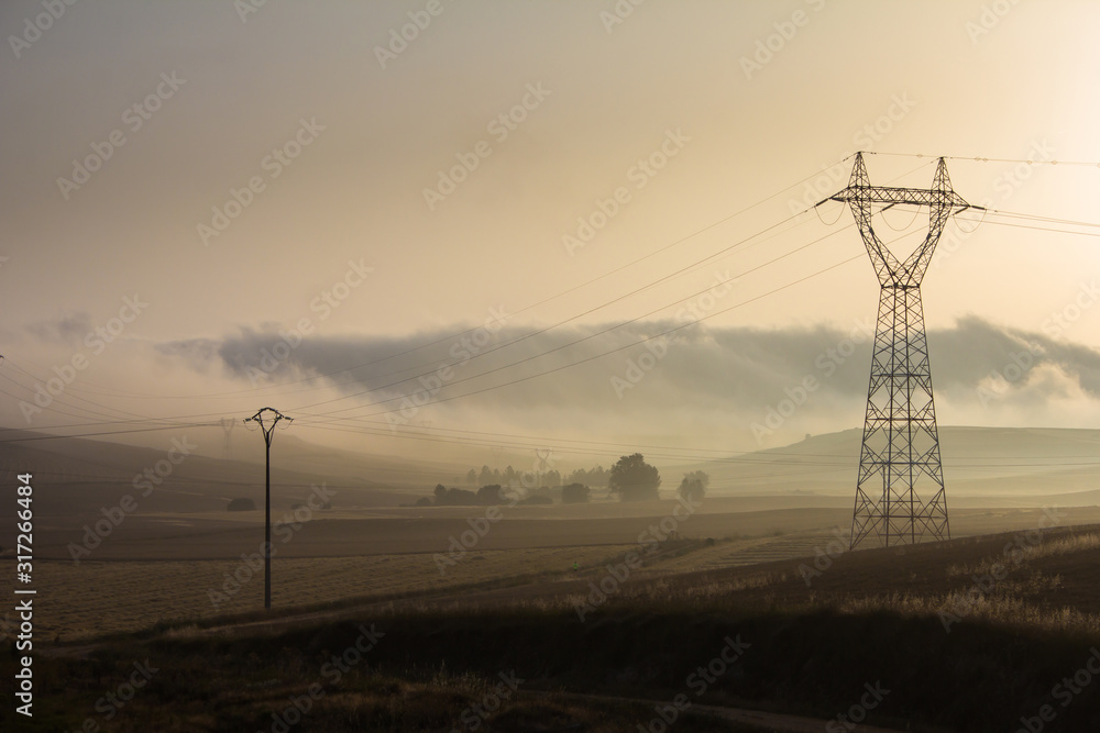 High Tension electrical lines passing through rural region of