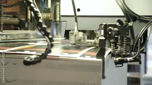 lose up of offset printing machines during production. Printing industry