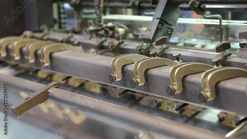 lose up of offset printing machines during production. Printing industry