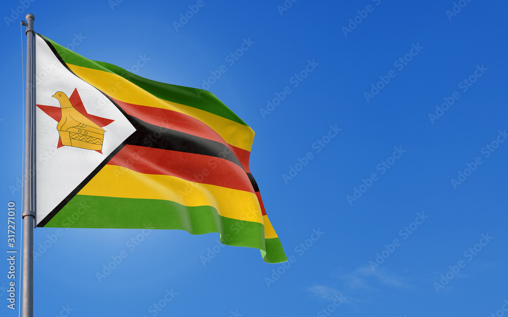 Zimbabwe flag waving in the wind against deep blue sky. National theme, international concept. Copy space for text. Zimbabwe flag waving in the wind against deep blue sky. National theme, international concept. Copy space for text.