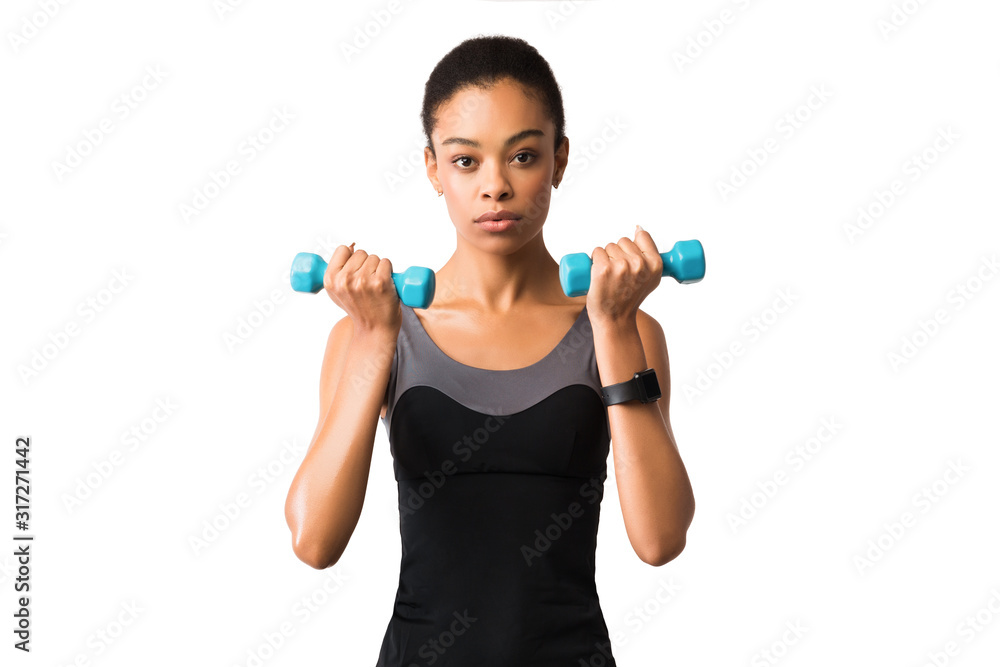 Woman Exercising Doing Dumbbell Biceps Curls On White Studio Background Woman Exercising Doing Dumbbell Biceps Curls On White Studio Background