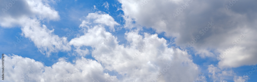 Naklejka Blue sky background with clouds