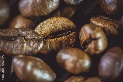 coffee grains close-up on a black background.