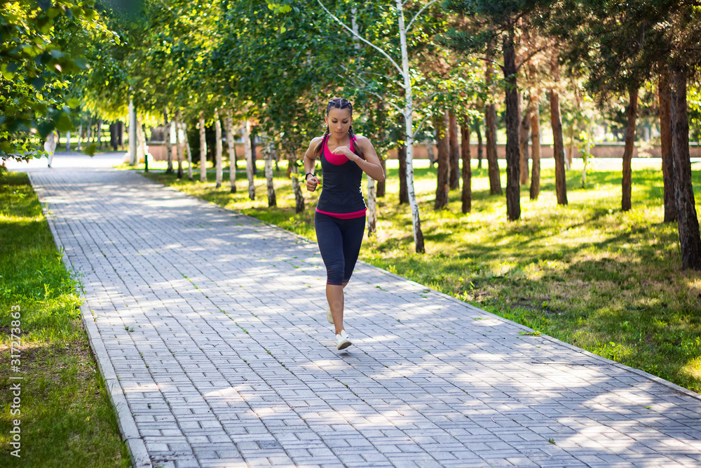 Fototapeta premium sporty woman doing jogging in the park