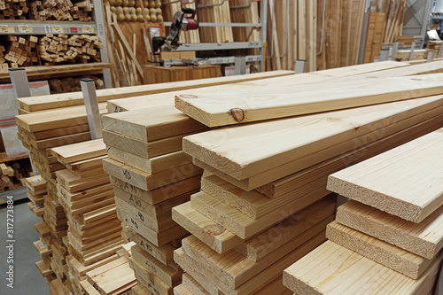 Ready sticks of wood at the store. Building materials store photo