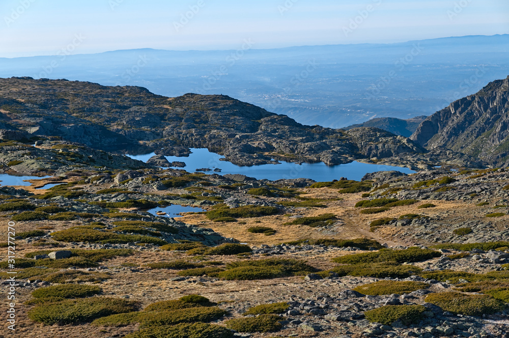 Lake in Serra da Estrela mountains from the aerial lift. Portugal Lake in Serra da Estrela mountains from the aerial lift. Portugal