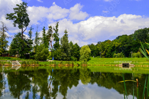 The lake in Feofania park, sunny summer landscape in Kyiv, Ukraine on July 15, 2018. 