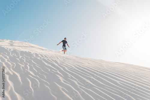 Sand dune traveller running