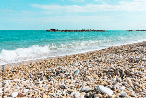 Adriatic Sea, beach with stones in Porto Recanati, Italy