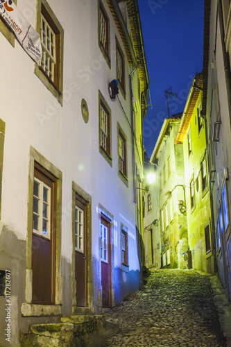 Fototapeta Naklejka Na Ścianę i Meble -  view on an ancient european narrow street at night
