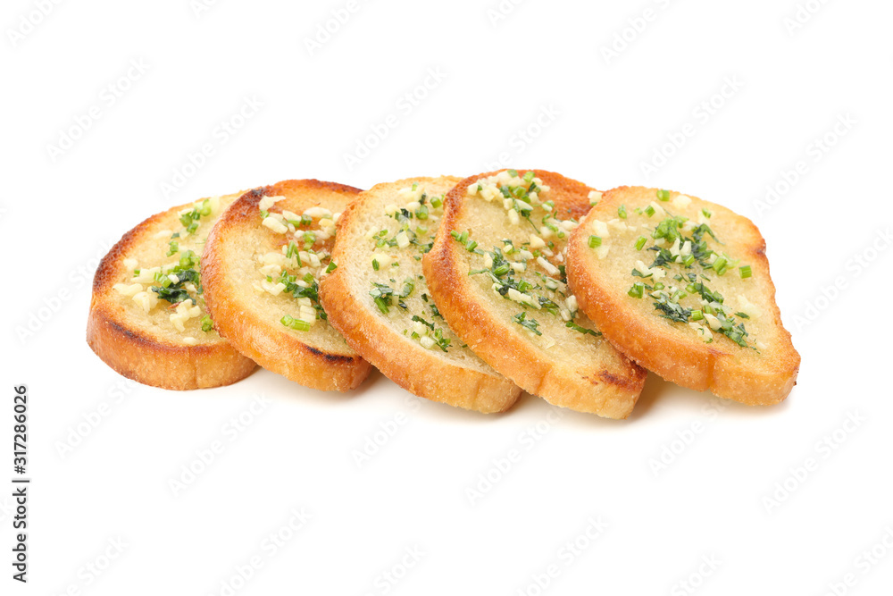 Toasted bread slices with garlic isolated on white background Toasted bread slices with garlic isolated on white background