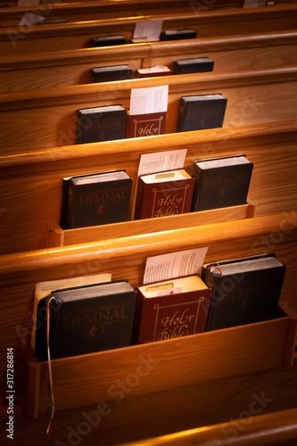Fotografija bibles and hymnals are all in a neat order in the pews of our church in Upstate
