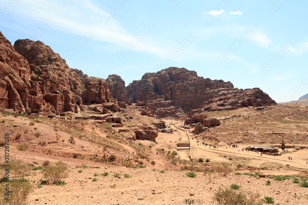 Panorama of ancient city of Petra with street of facades, amphitheatre and caves in Jordan Panorama of ancient city of Petra with street of facades, amphitheatre and caves in Jordan