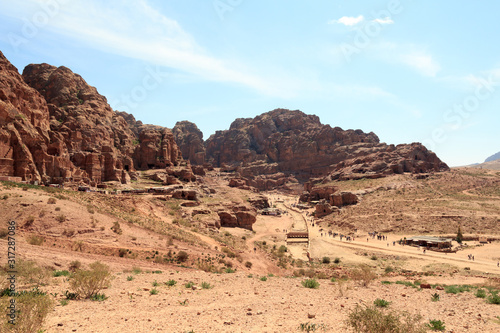 Panorama of ancient city of Petra with street of facades, amphitheatre and caves in Jordan