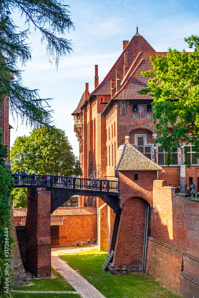 High Castle fortress defense walls and fortifications of the Medieval Teutonic Order Castle in Malbork, Poland High Castle fortress defense walls and fortifications of the Medieval Teutonic Order Castle in Malbork, Poland