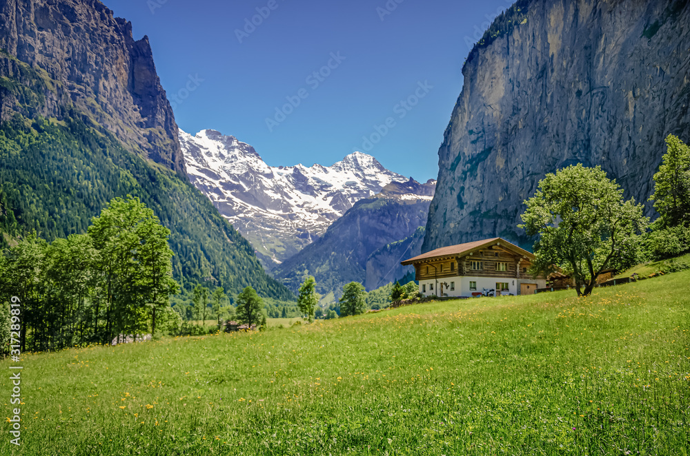 Homestead in the Lauterbrunnen valley, Switzerland Homestead in the Lauterbrunnen valley, Switzerland