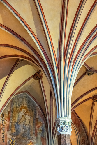 Richly decorated interior of the main capitulary with the characteristic gothic ceilings in the High Castle part of the Medieval Teutonic Order castle and monastery in Malbork, Poland