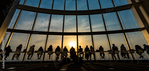 People silhouette inside Observation Deck. Tokyo, Japan.