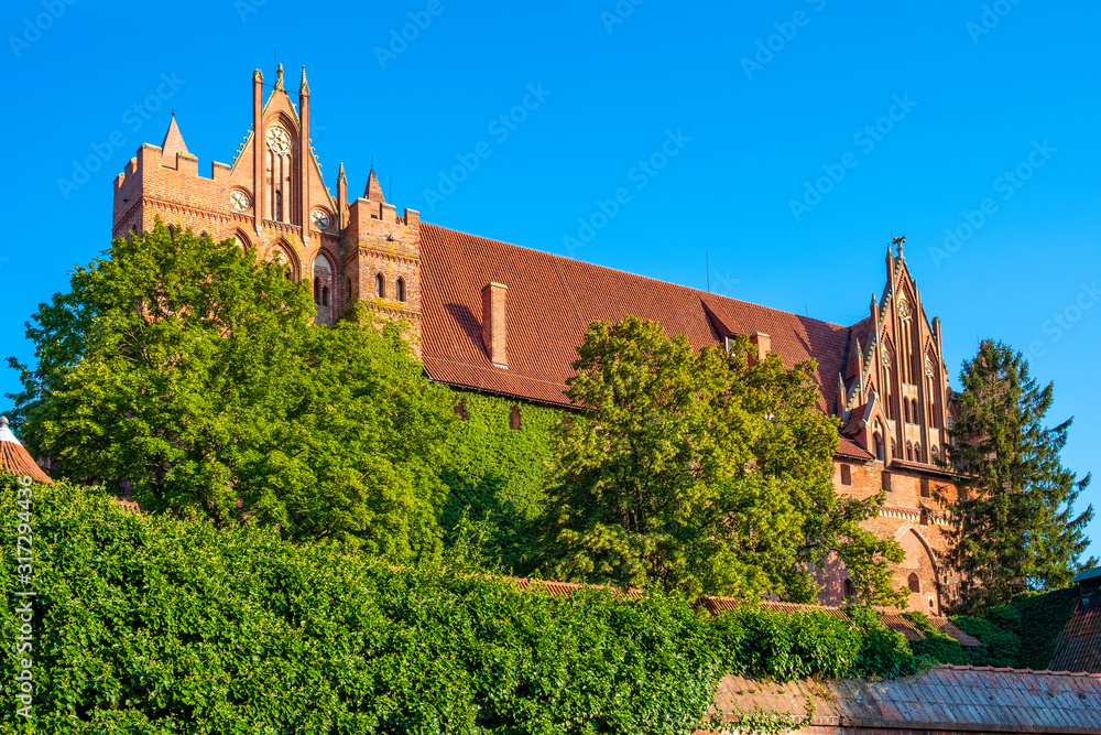 Panoramic view of the High Castle fortress defense walls and fortifications of the Medieval Teutonic Order Castle in Malbork, Poland