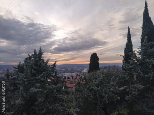 Cloudy sunset on Verona town